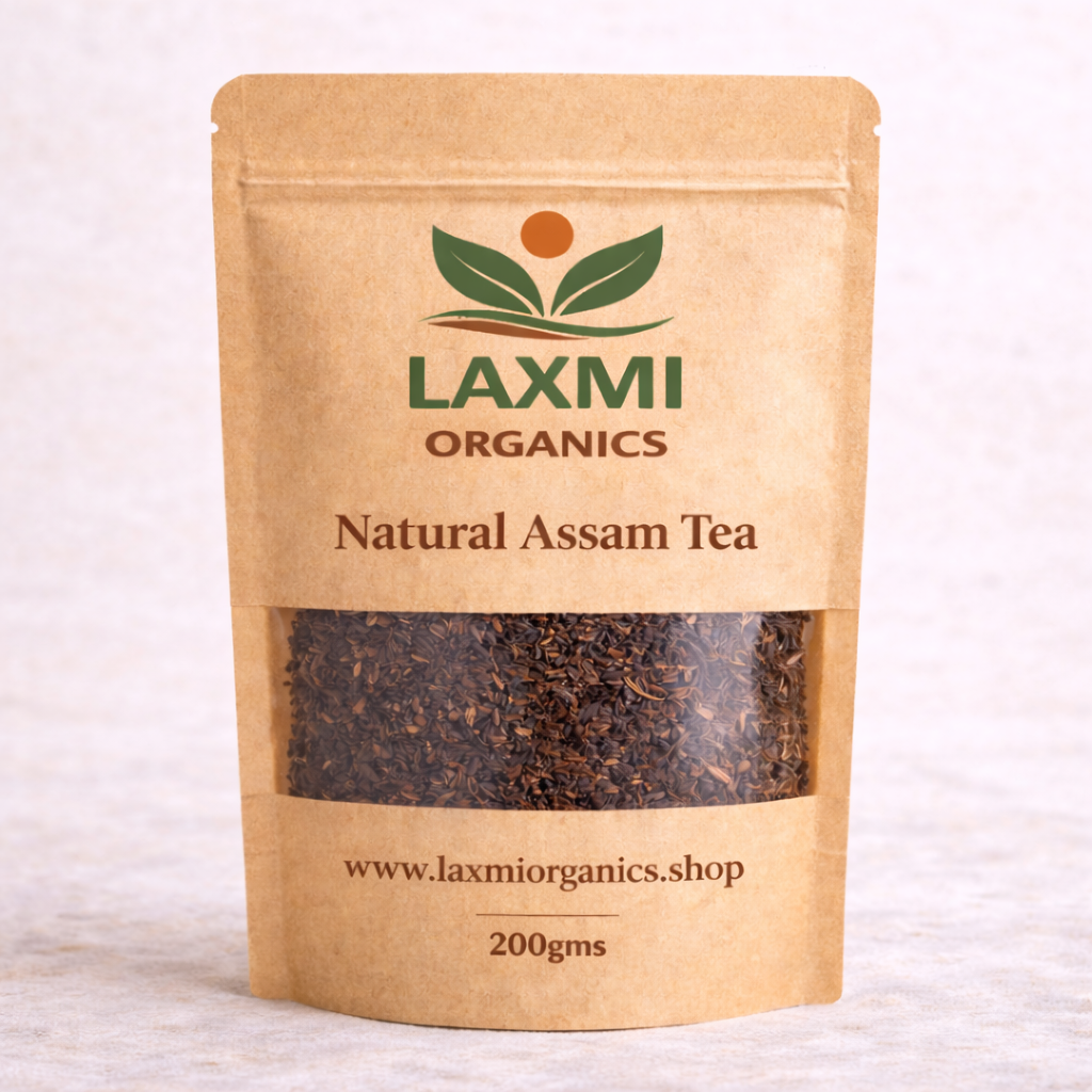 Kraft paper tea bag with Laxmi Organics branding on a light background